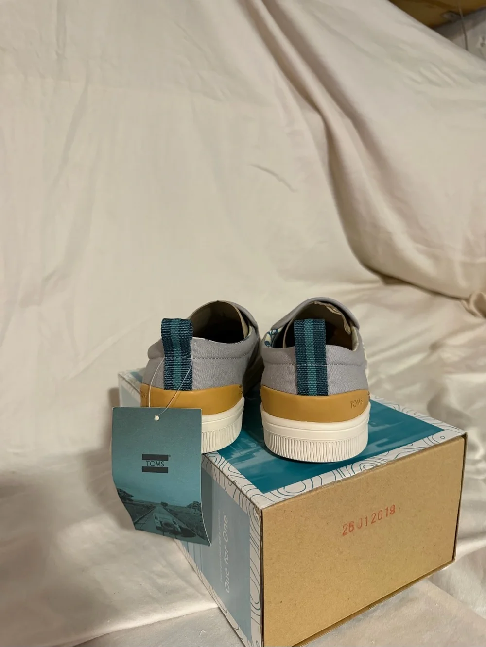 Toms Women’s Slip-On Sneakers in Light Gray and Cream Sole